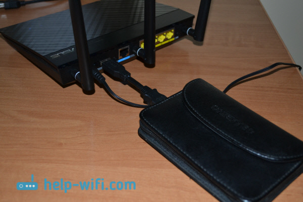 Подключите флэш-накопитель USB или внешний жесткий диск к маршрутизатору Asus. Совместный доступ к файлам на маршрутизаторе